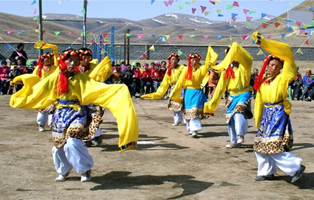 Propaganda Performance Complete With Traditional Colors of Communist China's Flag!